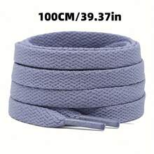 各种款式和尺码的平底休闲鞋，配有平底鞋带