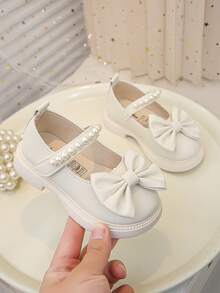 1双女童/儿童时尚优雅简约舒适珍珠蝴蝶结软底平底公主鞋，适合搭配连衣裙、牛仔裤、居家穿着、演出等，适合春、夏、秋季穿着。