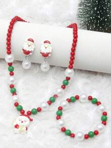 Conjunto de joyería de 4 piezas para niñas con encantos de Papá Noel, incluyendo pulsera, brazalete, aretes y collar, adecuado para fiestas navideñas, con cuentas de colores aleatorios