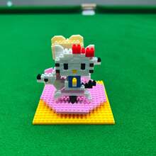 Juguete de bloques de construcción del Carrusel de Ferris Wheel Seesaw de Melody Kulomi Hello Kitty, modelo de juego deluxe para niños, adecuado para niños y niñas en juegos de rompecabezas DIY, juegos de anime, amantes de los bloques de construcción, decoración de escritorio, útiles escolares, también adecuado como regalo de Navidad y cumpleaños. Juguetes de personajes de anime para niños y niñas.