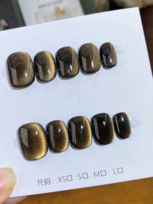 10 miếng dán móng tay hình oval ngắn thủ công, kiểu vàng Y2K, màu trơn tối giản hình mắt mèo với nhũ mịn, thích hợp cho phụ nữ và bé gái sử dụng vào mùa thu/đông, các bữa tiệc Giáng sinh và sử dụng hàng ngày. - Vàng - Xem 1