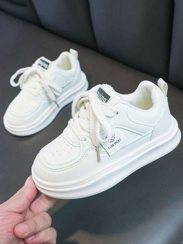 1 par de zapatos deportivos casuales de moda para niños, zapatos blancos pequeños versátiles para estudiantes de unicolor, zapatos planos simples y ligeros, zapatos neutros para niñas para exteriores, zapatillas con cordones y puntera redonda para niños, adecuados para primavera y otoño