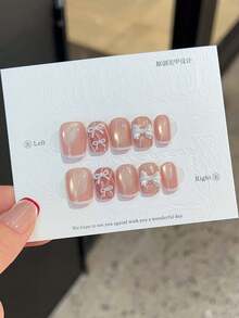 升级您的风格，手工按压式指甲套装短方形法式心形简约果冻粉色美甲套装，适合派对、婚礼或日常佩戴的长指甲，包括 2 块果冻凝胶和 1 个缓冲剂 - 淺粉色 - 查看 6