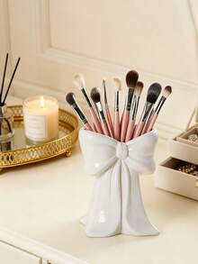 1个可爱蝴蝶结造型笔筒 - 桌面收纳架，可放置化妆刷和办公用品，优雅的化妆刷收纳设计，适合女孩、学生和创意家居装饰，也适合度假、海滩、浴室、卧室等场合，是母亲节的绝佳礼物。 - 彩色 - 查看 16