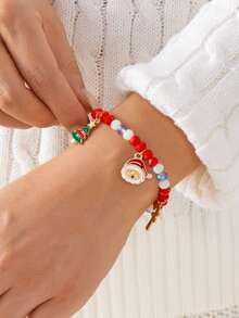 2 piezas/paquete Brazalete con colgantes de Papá Noel, árbol de Navidad, caramelo, muñeco de nieve y bastón de caramelo con letras navideñas - Elementos navideños de moda y versátiles para fiestas, eventos y regalos (color aleatorio - sin tarjeta)