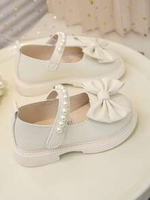 1双女童/儿童时尚优雅简约舒适珍珠蝴蝶结软底平底公主鞋，适合搭配连衣裙、牛仔裤、居家穿着、演出等，适合春、夏、秋季穿着。