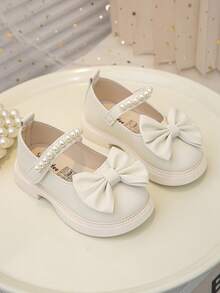 1双女童/儿童时尚优雅简约舒适珍珠蝴蝶结软底平底公主鞋，适合搭配连衣裙、牛仔裤、居家穿着、演出等，适合春、夏、秋季穿着。