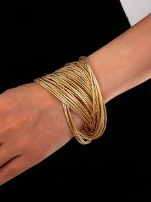 3 Sizes Available: 30pcs/Set, 50pcs/Set, 77pcs/Set Matte Gold Tone Coil Bangle Bracelet, Designed For Women, Suitable For Party, Holiday, Jewelry Accessory (Note: The 50pcs Set Is Shown In The Main Image, The 77pcs Set Has A Better Wearing Effect, The 30pcs Set Has Slightly Different Wearing Effect, And The Product Color May Vary Slightly Under Different Lighting Conditions, Suitable For Different Wrist Sizes)