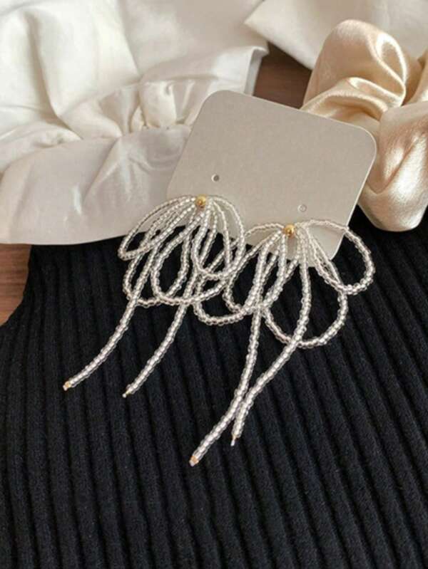 1 par de brincos de contas da moda, doces, românticos e elegantes, adequados para uso diário feminino com brincos longos para presente