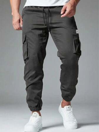 Herrbyxor med avslappnad utomhusfunktion, trendiga arbetsbyxor med dragsko i midjan