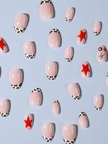 24片装Eightball Nails短款椭圆形豹纹美甲贴纸，星形亚克力按压式美甲贴片，包含1瓶果冻胶和1把指甲锉。Eightball短款美甲贴纸让您的指尖闪耀动人，适合派对、舞蹈和日常使用。 - 彩色 - 查看 4