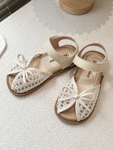 2025夏季新款镂空编织头儿童凉鞋，新款韩版女童蝴蝶结公主裙鞋