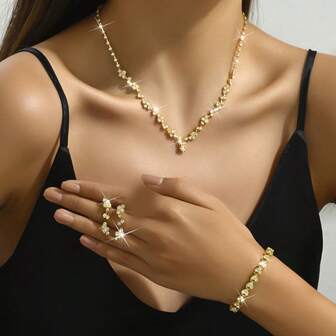 4-delars set: Halsband med kristall och strass, örhängen, armband, brudsmyckeset