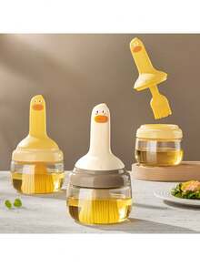 1 pieza Botella de aceite con forma de pato resistente al calor, con cepillo incorporado, mango de silicona, puede contener aceite, apta para hornear y asar a la parrilla, fácil de limpiar, herramienta de cocina linda, todo en un solo botella de aceite