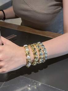 1 pieza Pulsera elástica minimalista y elegante con combinación de corazón de oro, plata y perla, adecuada para hombres y mujeres para uso diario y reuniones