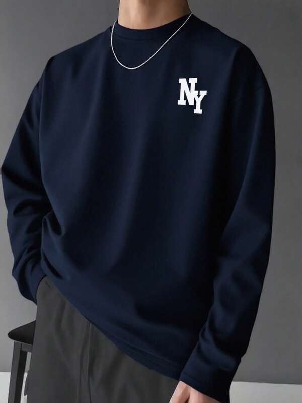 Prenda versátil para otoño | Camiseta de manga larga con cuello redondo y estampado del elemento de Nueva York en color albaricoque, adecuada como regalo para esposo, novio o amigo