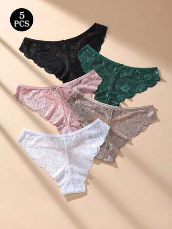 5 st. sexiga damer med spetsdetaljer och låg midja, stringtrosor med rosettutskärning