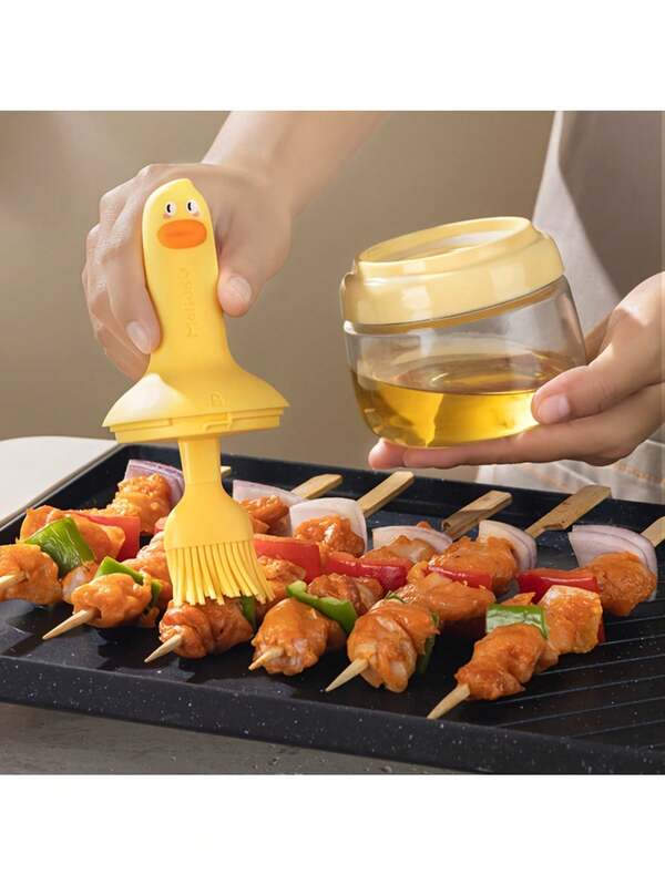 1 pieza Botella de aceite con forma de pato resistente al calor, con cepillo incorporado, mango de silicona, puede contener aceite, apta para hornear y asar a la parrilla, fácil de limpiar, herramienta de cocina linda, todo en un solo botella de aceite