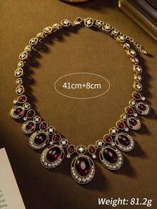 A Vintage Luxury Dual-Tone Gemstone Pendant Necklace And Earrings Set, Made Of Alloy Base With Gemstone Accents, Featuring A Delicate Dangling Design, Elegant And Luxurious, Perfect For Galas, Parties, And Holiday Celebrations