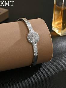 1 buc. Brățară rotundă geometrică creativă cu zirconiu cubic încrustat cu cupru, concepută cu lux și eleganță pentru a vă îmbunătăți ținuta.