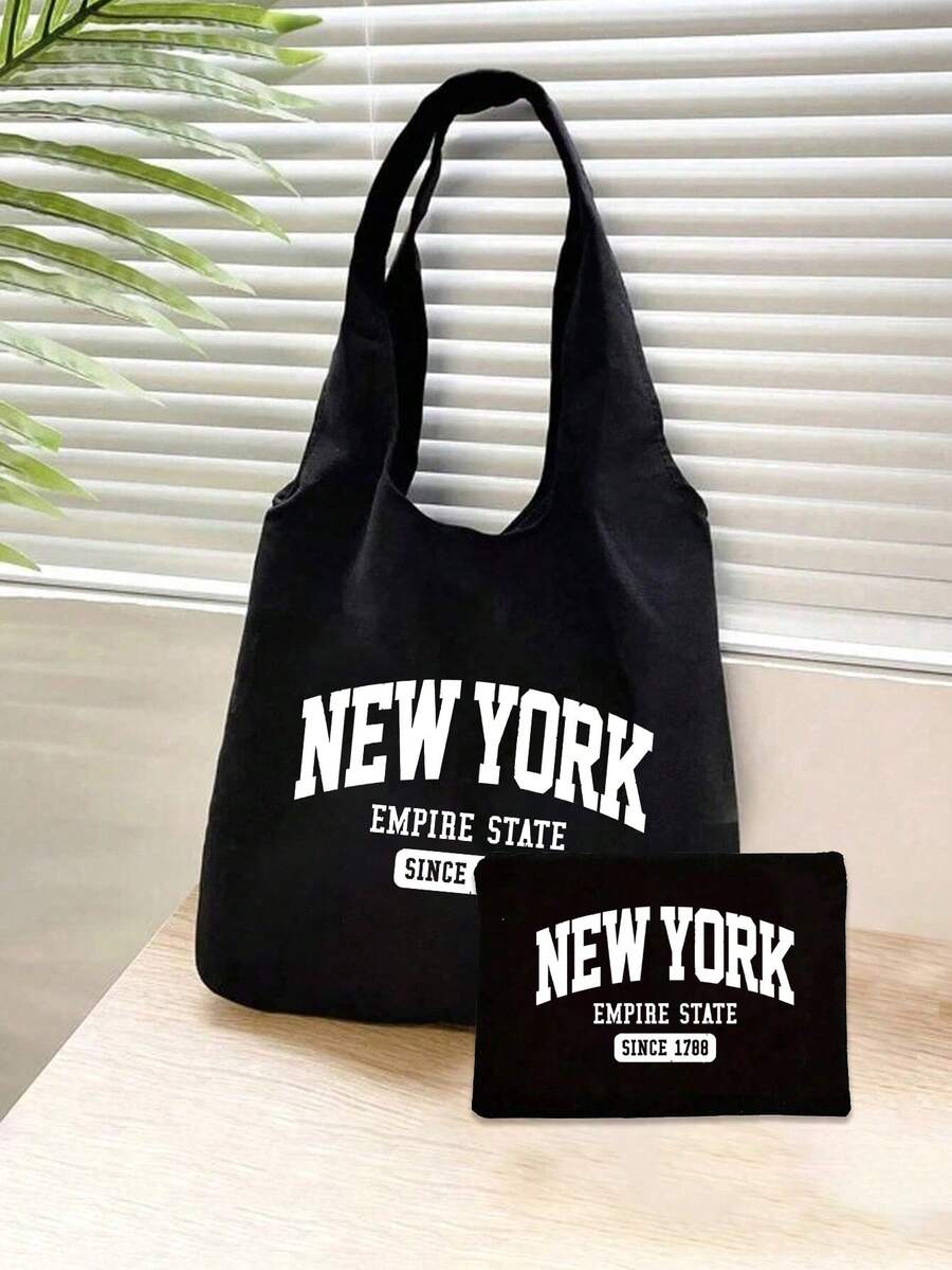 黑色时尚“纽约”字母印花帆布手提包，配有简约肩带，附赠小型化妆包，女士便携购物袋，是送给纽约女士的理想礼物，女士手提包，休闲百搭包，经典设计，结实耐用的手柄，时尚爱好者的必备单品，旅行配件，轻便百搭包，是送给家人、朋友、爱人或同学的完美礼物，尤其适合感恩节。 - 彩色 - 查看 1
