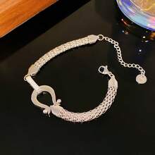 Brazalete trenzado con hebilla de herradura con diamantes microincrustados, de moda y popular, lujoso y elegante para mujeres