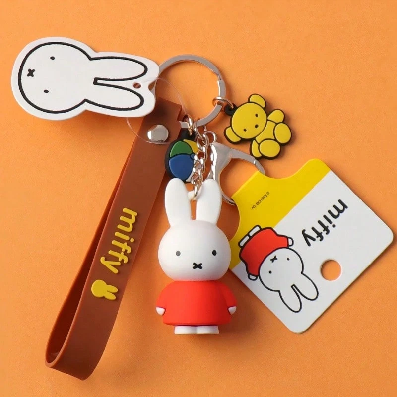 米菲经典布鲁纳色钥匙扣吊饰，荷兰国家标志性兔子吊坠，永恒简约的设计，纯色色调，耐用的 PVC/树脂材料，可爱的包包车钥匙配件，IP 授权收藏品，米菲粉丝的完美礼物，怀旧卡通装饰件 - 彩色 - 查看 1