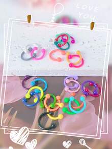 Caja misteriosa Juego de 10 piezas de colores aleatorios que incluye: Aro de nariz, Clavo de nariz, Aro de nariz en forma de C con pintura horneada, Clavo de ceja, Aro de hueso de oreja, Accesorio de perforación humana, Regalo de cumpleaños para mujeres