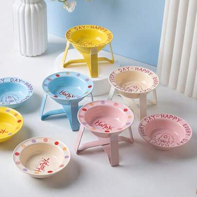 Die fliegende Untertasse-Schüssel mit einem leichten Eisenrahmen, eine keramische Haustier-Schüssel mit einem Ständer, ist hygienisch und leicht zu reinigen. Es ist eine kleine Katzen-Schüssel, eine kleine Hunde-Schüssel und eine Wasser-Schüssel mit einem kreativen und einfachen Stil