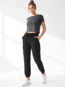 Pantalones para mujer con resorte tipo cargo - Negro - Ver 1