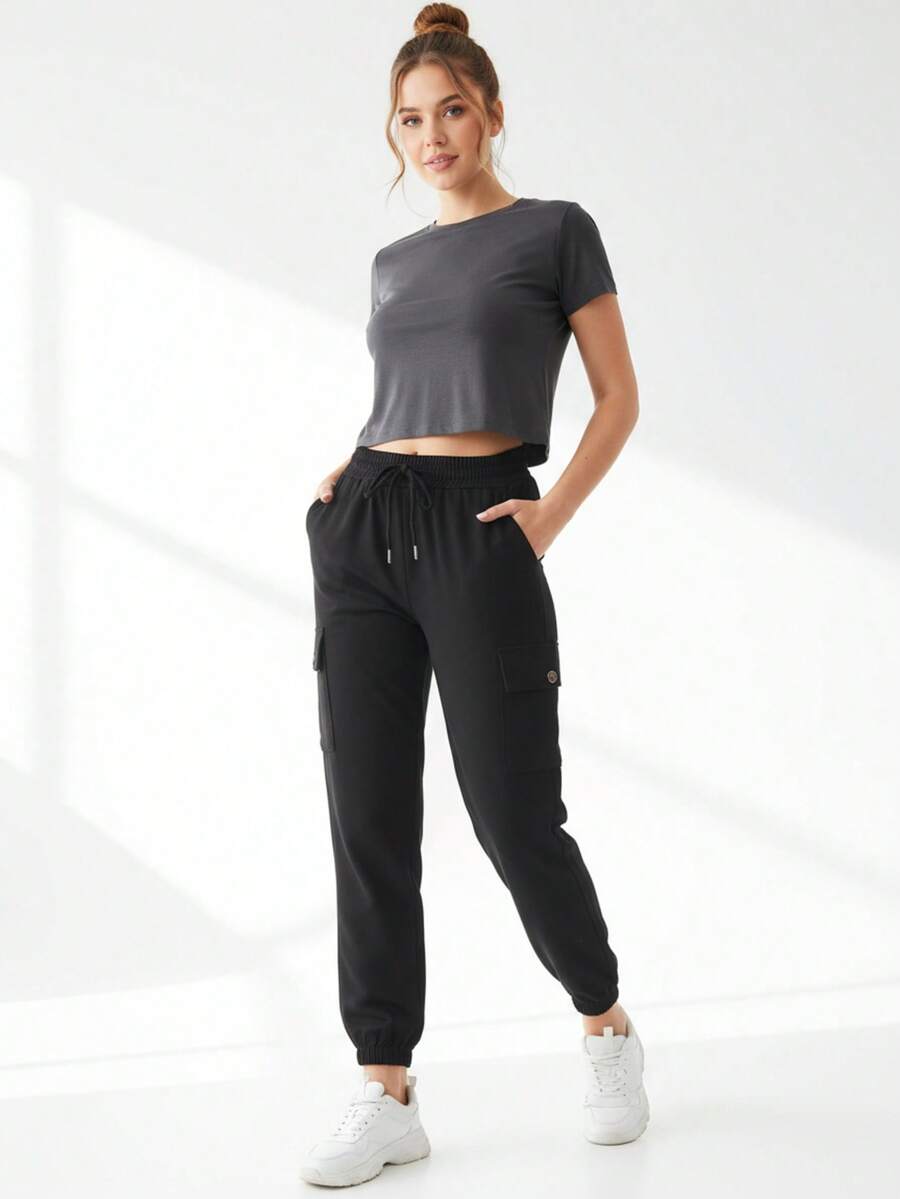 Pantalones para mujer con resorte tipo cargo - Negro - Ver 1