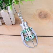 Mini pinza de garra - Garra de muñeca realista. Material de plástico. Puede agarrar y colgar - Juguete antiestrés - Llavero colgante - Accesorio DIY divertido - Regalo pequeño de cumpleaños - Sorpresa festiva - Regalo de Navidad - Baratija del Día de San Valentín - Juguete antiestrés de oficina - Decoración de escritorio - Coleccionable para adultos