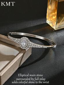 1 buc. Brățară rotundă geometrică creativă cu zirconiu cubic încrustat cu cupru, concepută cu lux și eleganță pentru a vă îmbunătăți ținuta.