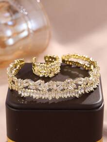 rakol Set de 2 piezas de anillo y pulsera con decoración asimétrica de circonita cúbica de moda - Dorado - Ver 3