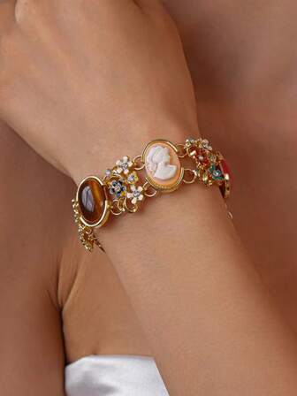 Regal & Refined: Women'S Geometric Bracelet In Golden - Toned Alloy. Features Antique Relief, Natural Stone Enamel, And Vivid Blue, Green, Red, Pink Gemstones. An Adjustable Chain Clasp Makes It Ideal For Daily Wear And As A Stunning Gift Jewelry