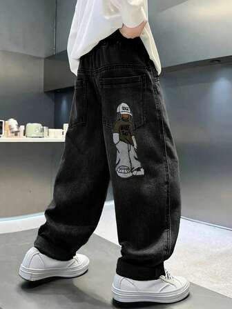 Pantalones vaqueros de mezclilla lavados con bordado de dibujos animados de moda informal para niño preadolescente