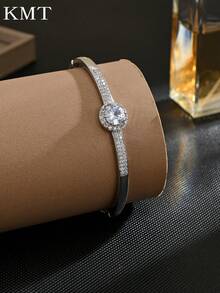 1 buc. Brățară rotundă geometrică creativă cu zirconiu cubic încrustat cu cupru, concepută cu lux și eleganță pentru a vă îmbunătăți ținuta.