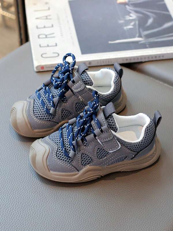 1 paire de chaussures de sport pour enfants avec blocs de couleurs, semelle souple et confortable, lacets orange attrayants, énergique et antidérapante