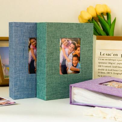 7 英寸 100 片相册架，带布质封面，适合存放家庭周年纪念和婚礼照片