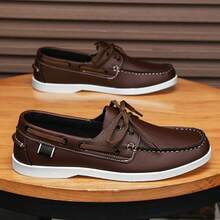 A Pair Of Men's Summer Outdoor Casual Loafers With Simple Color Schemes, Featuring A Fashionable Style That's Easy To Match.