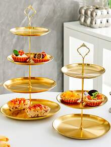 This Gold/Silver Three-Tiered Metal Dessert Stand Is An Elegant European-Style Display Stand For Cakes And Pastries. Ideal For Afternoon Tea, Wedding Decorations, And Other Occasions, It's Primarily Used To Showcase Desserts And Pastries. Cakes, Macarons, Cookies, And Other Treats Can Be Easily Placed On The Stand For Guests To Enjoy, While Also Serving As A Decorative Display. It Can Also Be Used As Table Decoration In High-End Restaurants. - Vàng - Xem 8