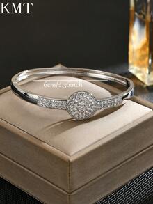 1 buc. Brățară rotundă geometrică creativă cu zirconiu cubic încrustat cu cupru, concepută cu lux și eleganță pentru a vă îmbunătăți ținuta.