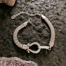 Brazalete trenzado con hebilla de herradura con diamantes microincrustados, de moda y popular, lujoso y elegante para mujeres