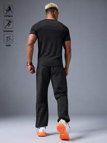 Manfinity Sport Polished Camiseta deportiva de manga raglán minimalista casual para hombres, de ajuste ceñido, cómoda, transpirable y que absorbe la humedad, de ajuste ceñido para entrenamiento en el gimnasio, camiseta de compresión de alto rendimiento - Negro - Ver 4