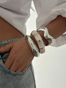 Brazalete de mujer de aleación asimétrico y abierto de acrílico de moda