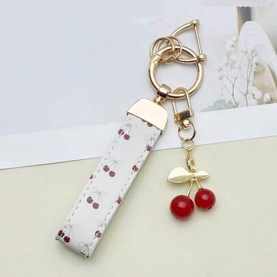 1pc Silky Bow Cherry UV Print Pendant, With Adorable Cherry Charm. Can Be Hung On Door Keys, Bags, Lightweight And Fashionable, Perfect For Female Car Owners!