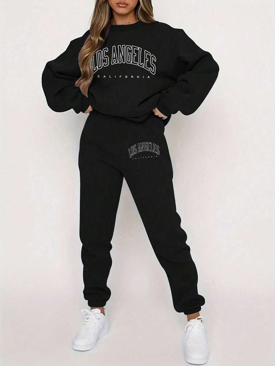 New European And American Style Los Angeles Letter Print Dark Blue Sweatshirt And Sweatpants Set For Women, Autumn And Winter With Fleece, Loose And Casual Two Pieces Sportswear. The Style Leans Towards Street Casual And American Campus Fashion, Combining Comfort And Fashion. A Must-Have Item For Valentine's Day, Suitable For Dates And Parties.