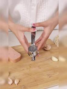 1 pieza Prensa de ajo de acero inoxidable, Trituradora de ajo circular de acero inoxidable, Picador de ajo, Fabricante de pasta de ajo para el hogar, Machacador manual, Exprimidor de jengibre de cocina, Accesorio de herramienta manual