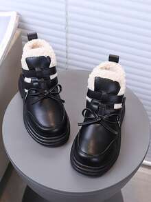 Botas versáteis de pelúcia estilo princesa para crianças, moda inverno 2025, botas grossas de cor sólida com laço decorativo para meninos e meninas