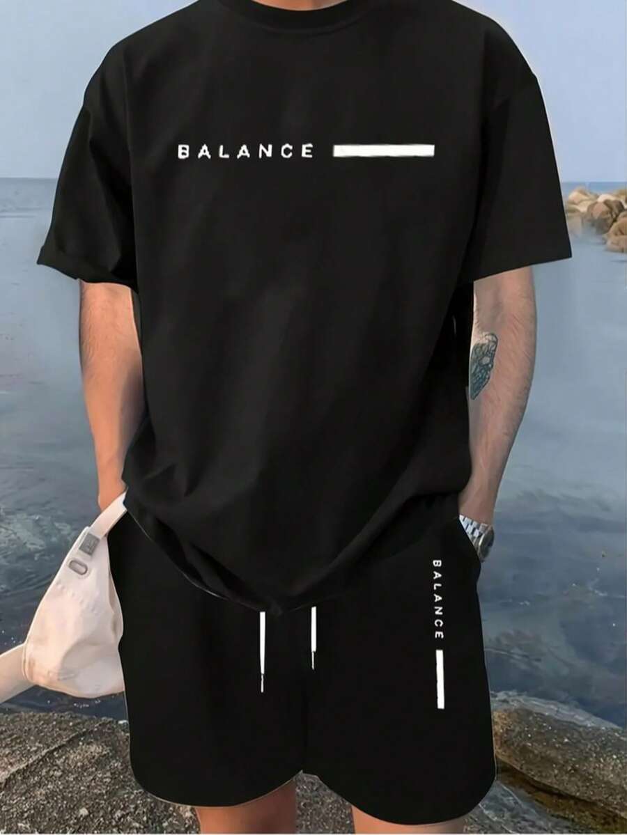 Playera Oversize de Algodón para Hombre en Color Negro con Estampado Minimalista "BALANCE" y Línea Blanca Estilo Urbano Streetwear Moderno y Casual - Negro - Ver 1